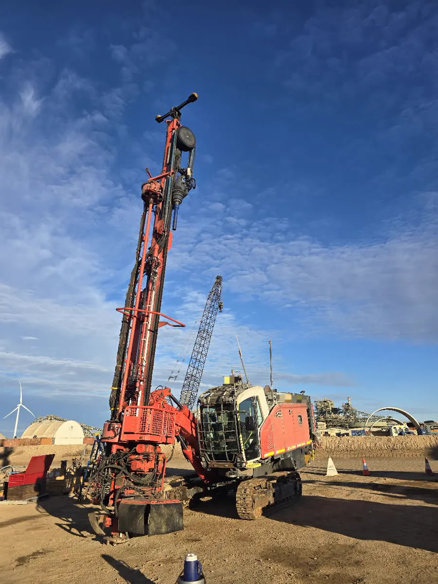 Rebuilt Sandvik Leopard with its mast raised against a morning sky