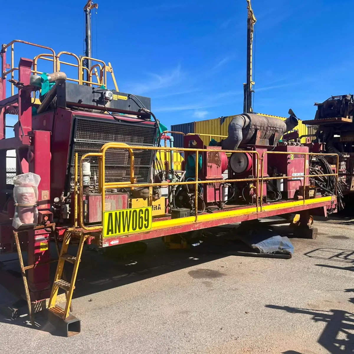 Side view of the weathered rig deck in the yard before teardown