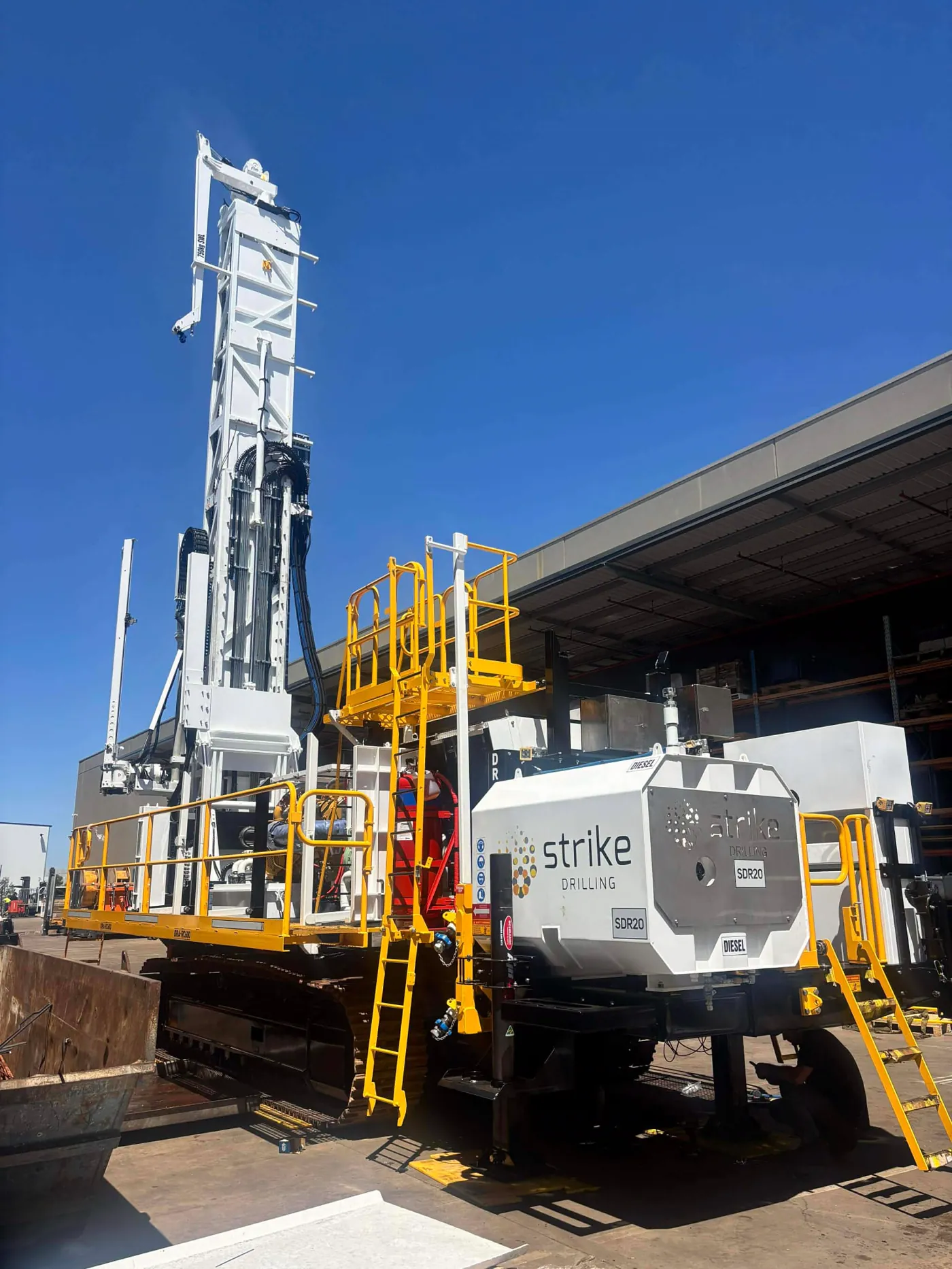 The finished Strike Drilling SDR20 rig, freshly rebuilt with mast up, ready to leave the Perth workshop